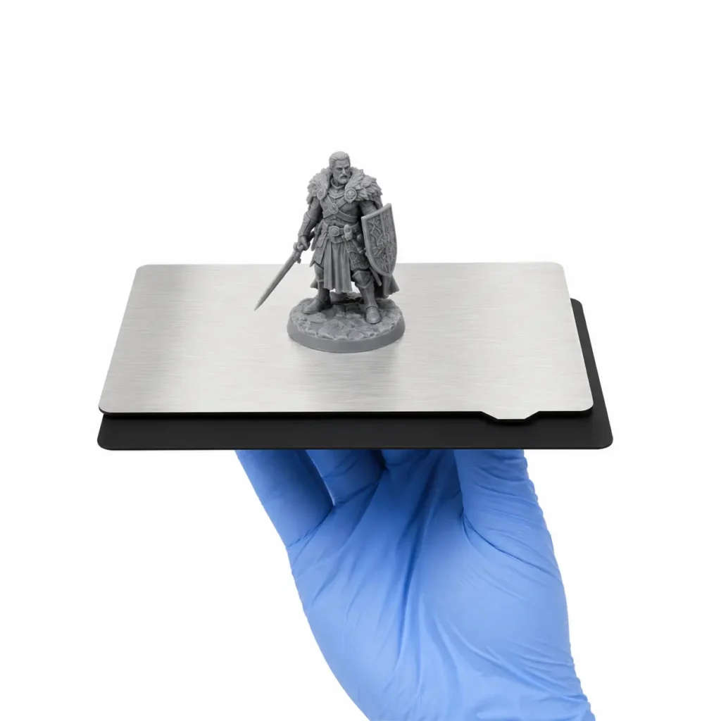 Resin printer spring steel flex plate with printed model in hand